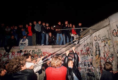 Berlin Wall Collapse: Triumphant Moment and Catalyst for German Reunification